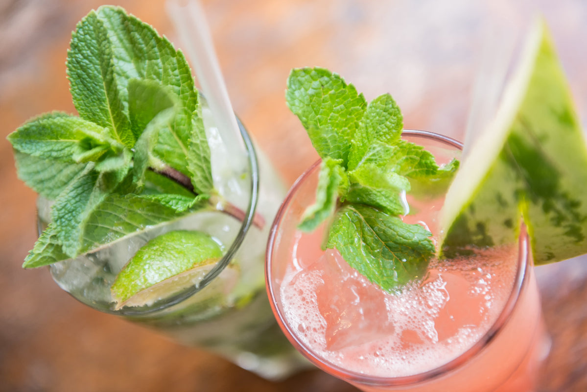 Watermelon and mint drinks illustrating how water-soluble cannabis drops can mix into beverages.